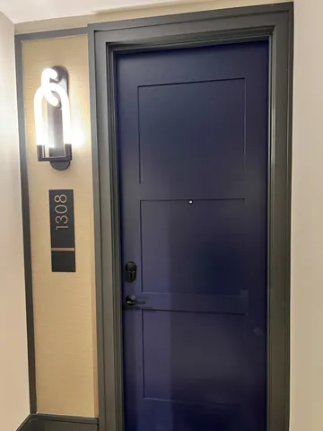 a kitchen with stainless steel appliances kitchen island a stove and a sink