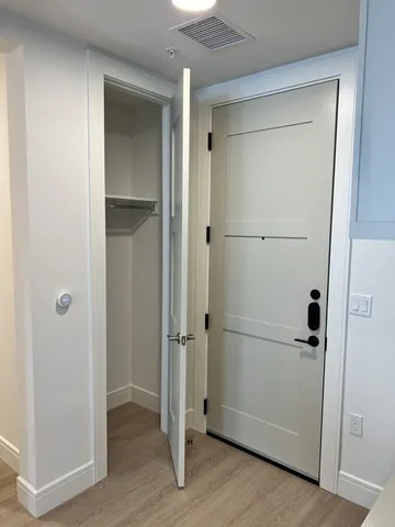 a view of an empty walk in closet