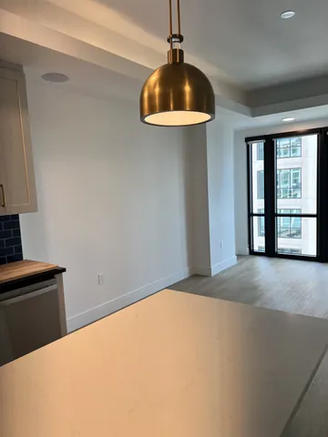 a bathroom with a glass door shower