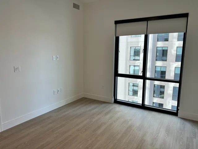 a kitchen that has a sink and a stove