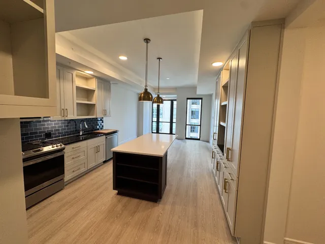 a view of a space with wooden floor