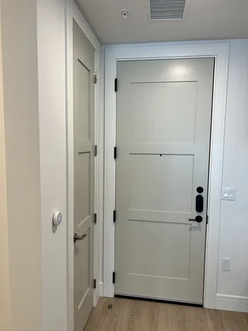 a kitchen with stainless steel appliances a stove a sink and a refrigerator