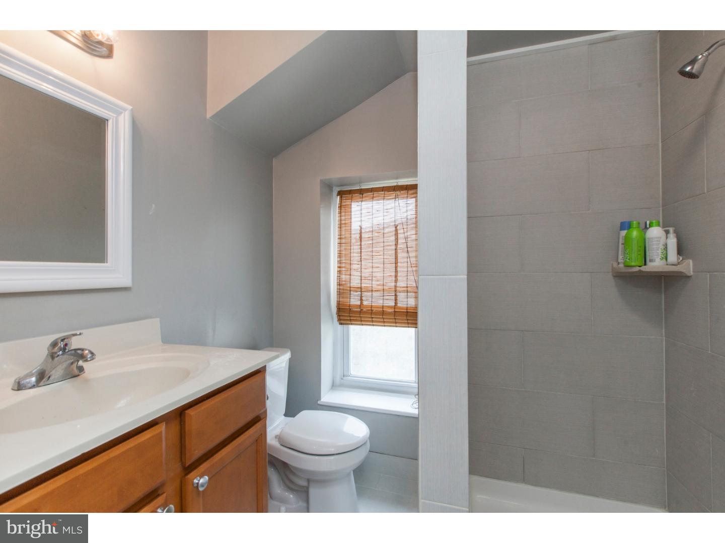 235 Roxborough Avenue Philadelphia, PA 19128 - Photo 16 of 22 a bathroom with a sink vanity granite and toilet
