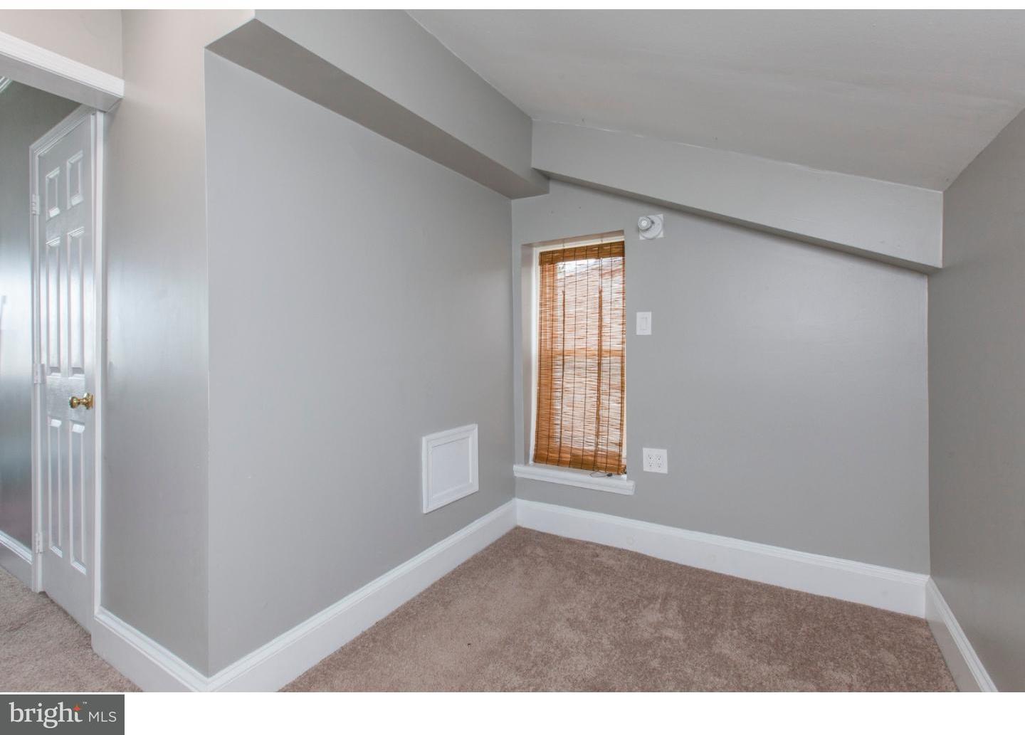 235 Roxborough Avenue Philadelphia, PA 19128 - Photo 17 of 22 a view of an empty room with a window
