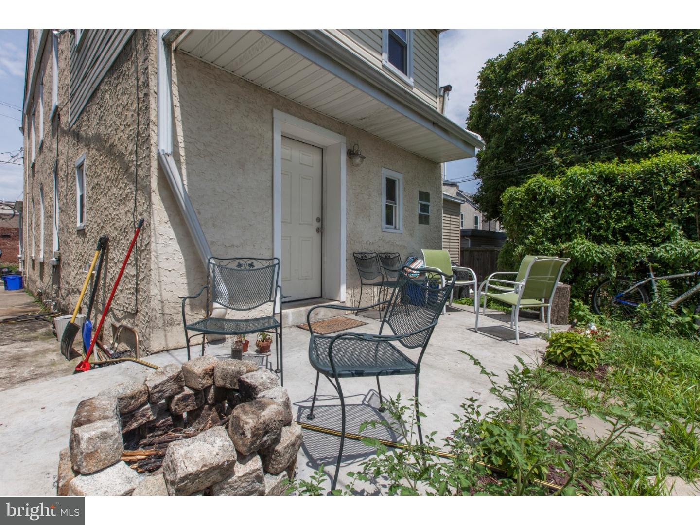 235 Roxborough Avenue Philadelphia, PA 19128 - Photo 19 of 22 a view of a patio with table and chairs and potted plants