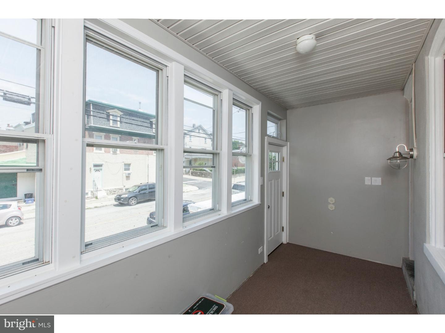235 Roxborough Avenue Philadelphia, PA 19128 - Photo 3 of 22 a view of an empty room with a window