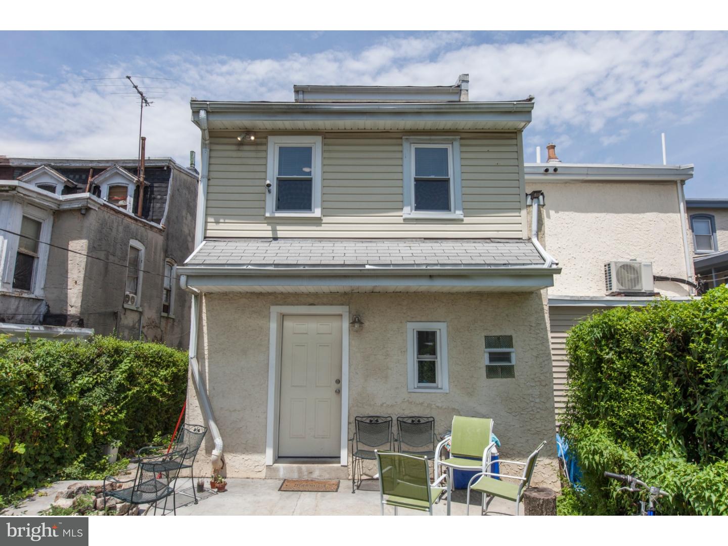 235 Roxborough Avenue Philadelphia, PA 19128 - Photo 21 of 22 a view of a house with a patio
