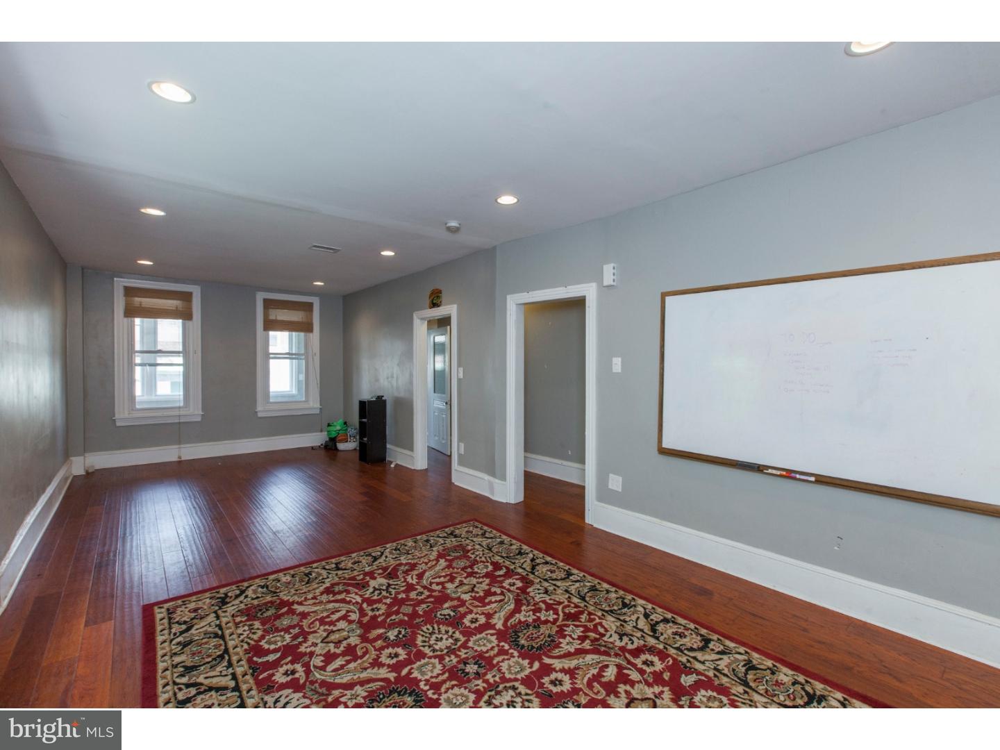 235 Roxborough Avenue Philadelphia, PA 19128 - Photo 5 of 22 a view interior of a house fire place and wooden floor