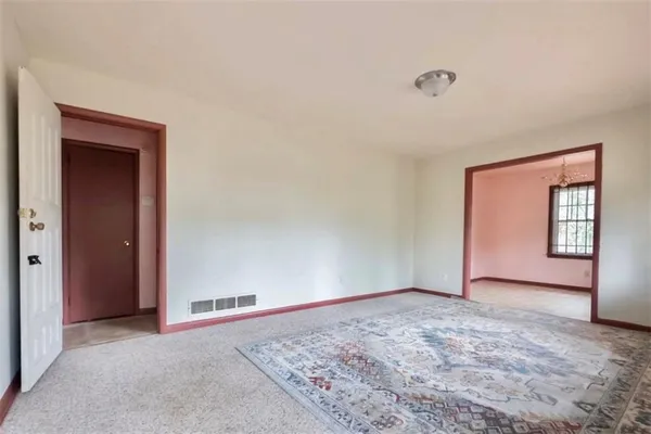 a view of an empty room and window