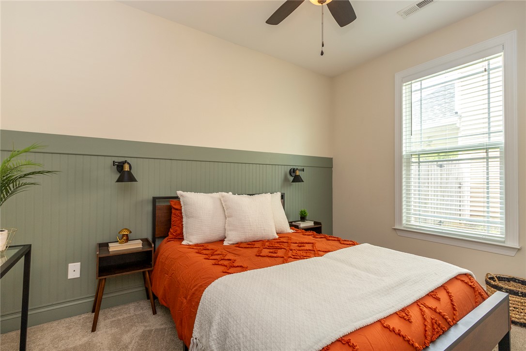 234 Streams Way Anderson, SC 29625 - Photo 20 of 44 This cozy bedroom offers a serene escape, perfect for relaxation and comfort.