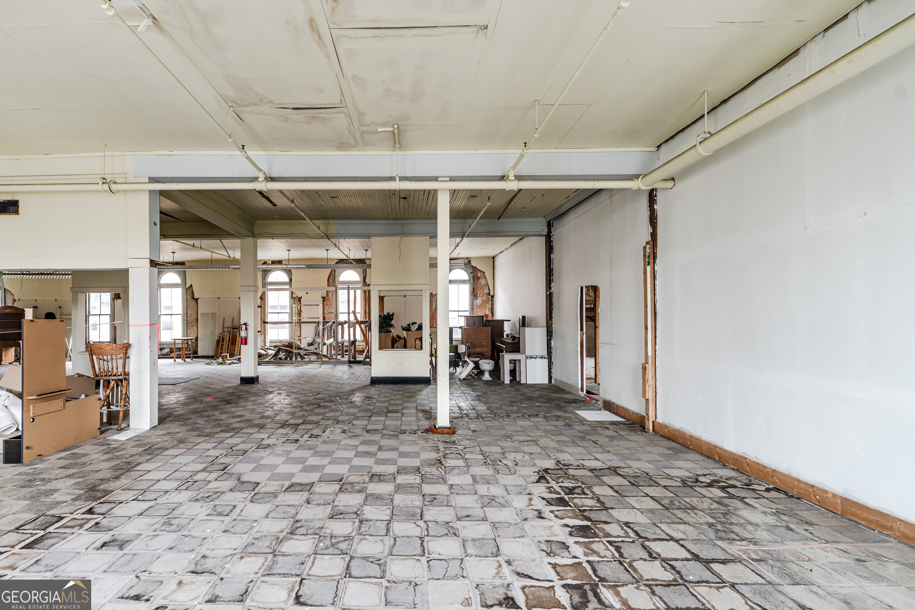8 East 3rd Avenue Rome, GA 30161 - Photo 10 of 18 a view of a room with gym equipment