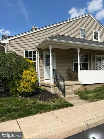 front view of a house and a yard