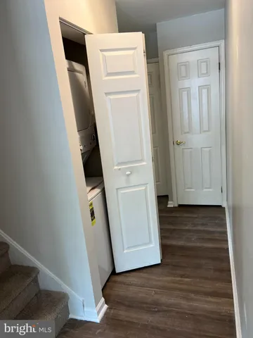 a view of an entryway with wooden floor