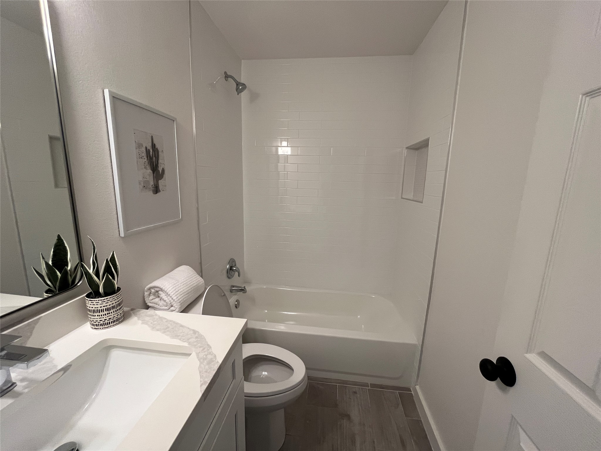 9502 Crown Ridge Road Austin, TX 78753 - Photo 8 of 8 Full bath with vanity, shower / tub combination, and tile flooring