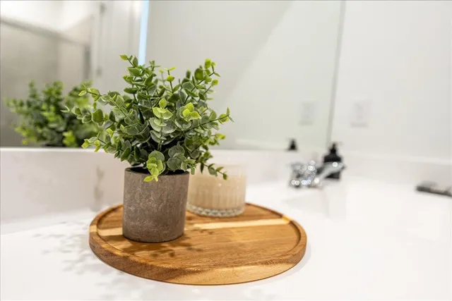 a vase of flowers sitting on a table