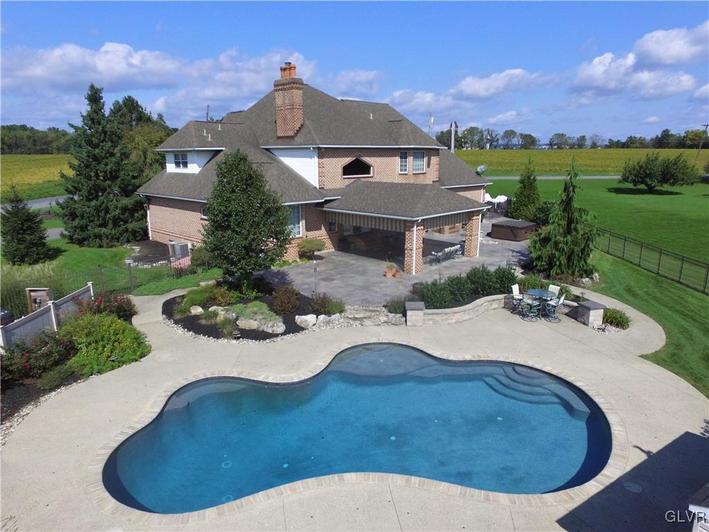 3967 Hollo Road Easton, PA 18045 - Photo 2 of 50 Monogram 20x40 custom pool with sunshelf installed