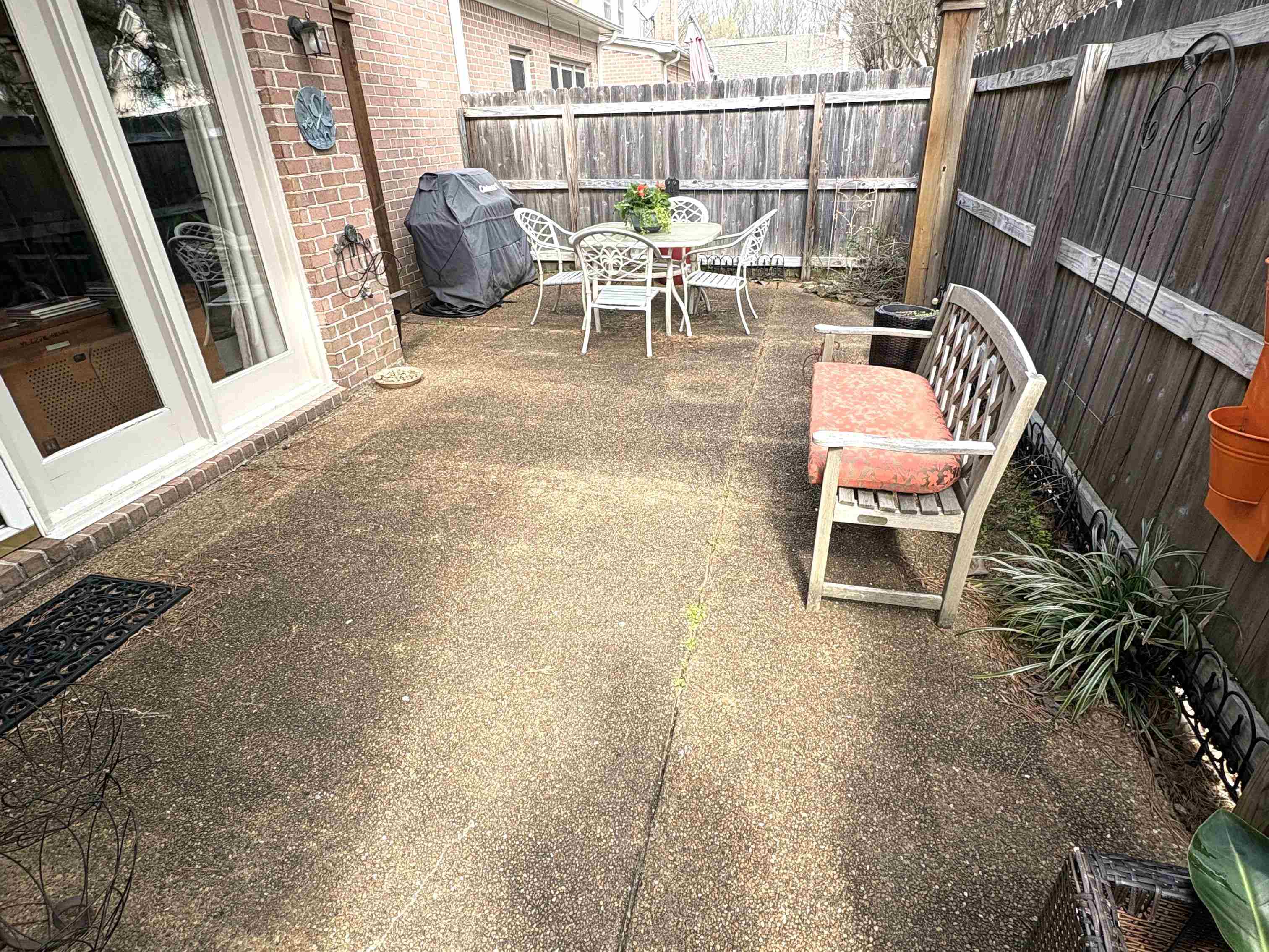 1730 Gosnold Bluff Road Collierville, TN 38017 - Photo 14 of 15 Fenced backyard featuring a patio area, grilling area, and outdoor dining space
