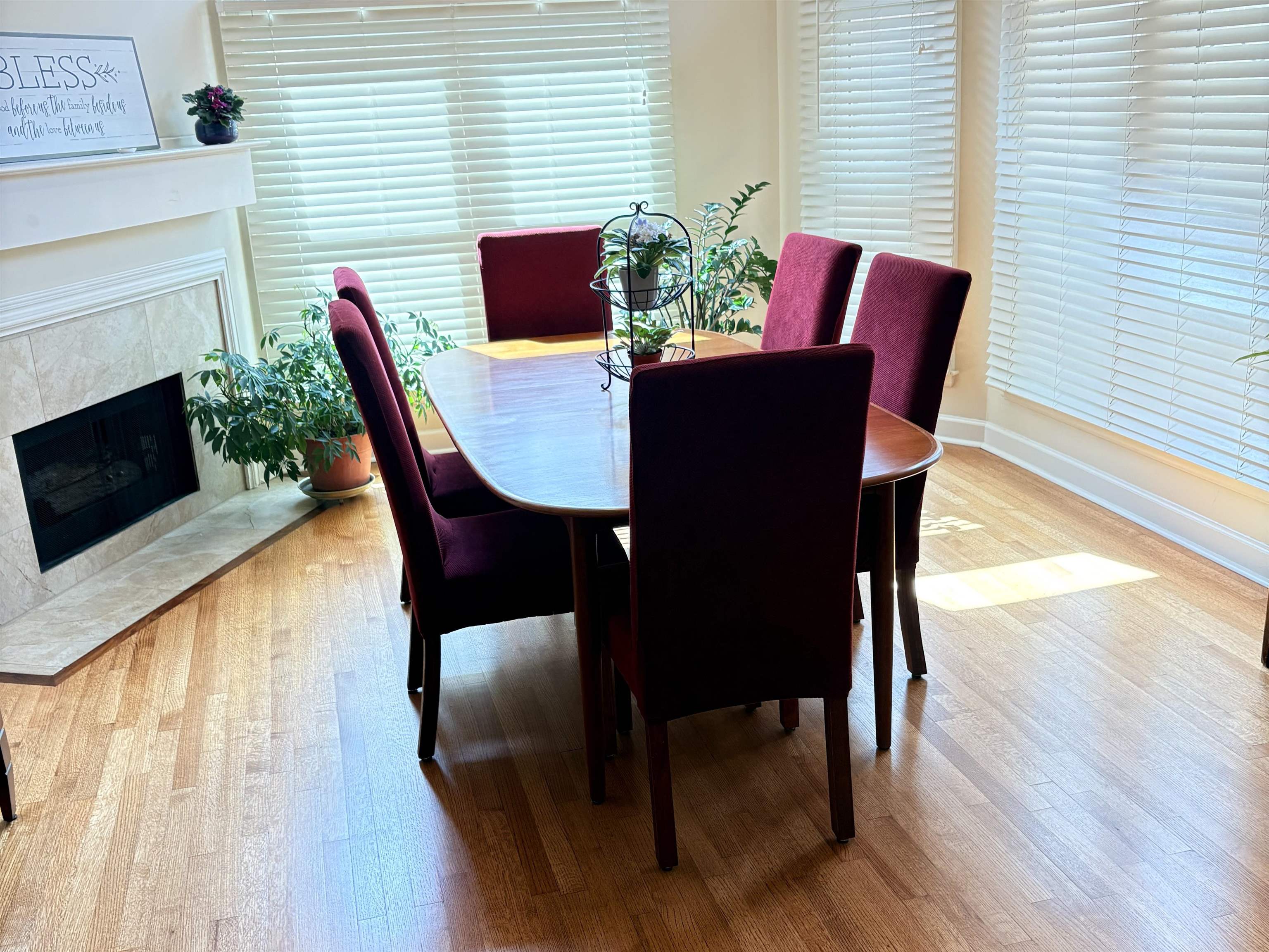 1730 Gosnold Bluff Road Collierville, TN 38017 - Photo 5 of 15 Dining room with a fireplace and light wood-style floors