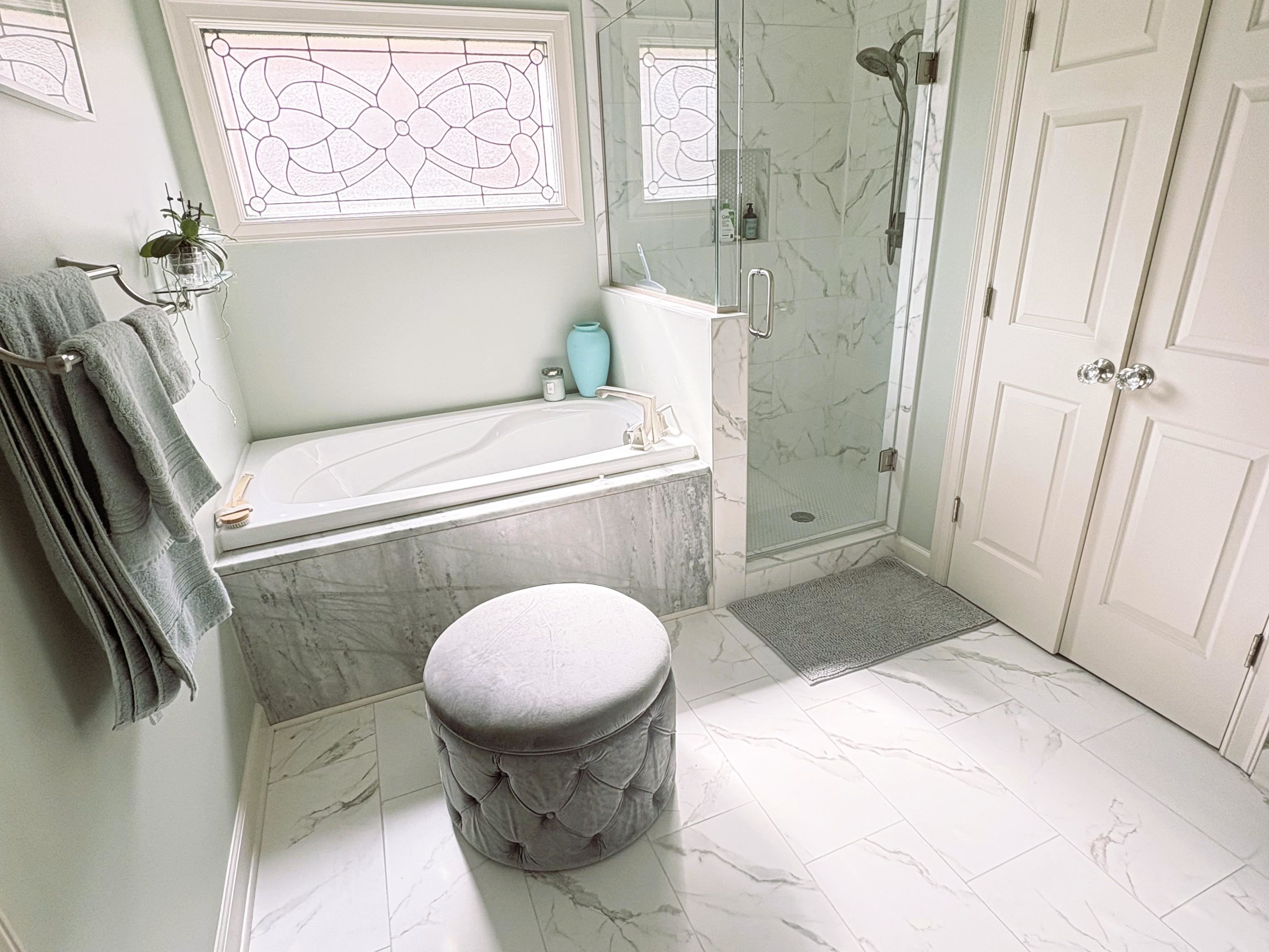 1730 Gosnold Bluff Road Collierville, TN 38017 - Photo 9 of 15 Bathroom featuring a marble finish shower, a garden tub, and light marble finish flooring