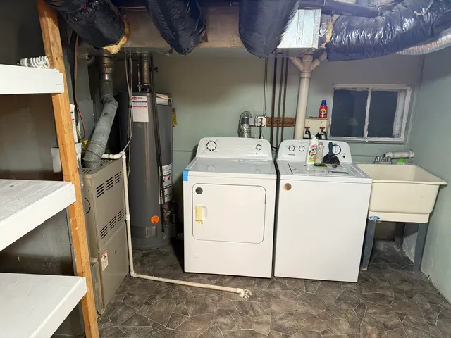 a utility room with dryer and washer