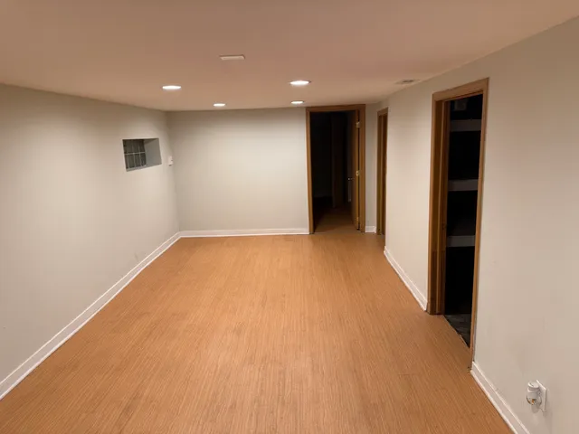 a view of hallway with a large window