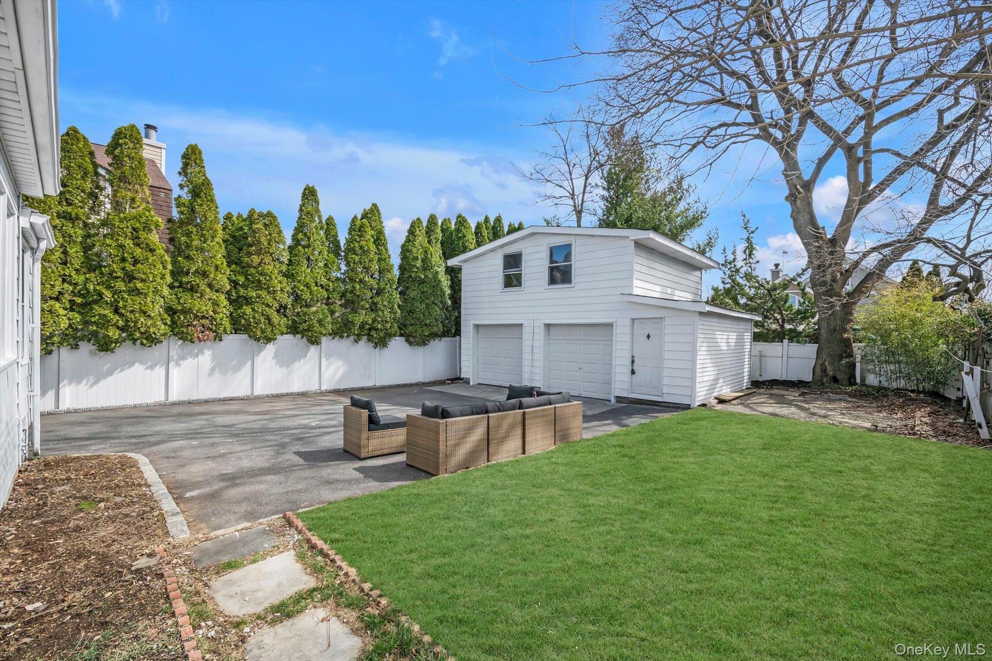 31 Walters Avenue Syosset, NY 11791 - Photo 28 of 29 a view of a patio with a yard