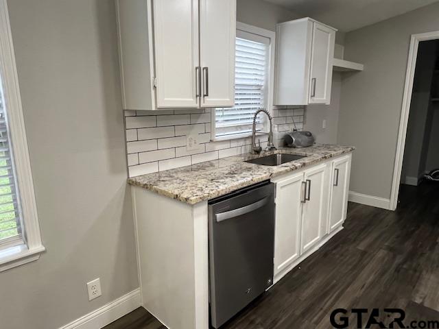 174 County Road 2604 Pittsburg, TX 75686 - Photo 12 of 22 a kitchen with stainless steel appliances granite countertop a sink stove and cabinets