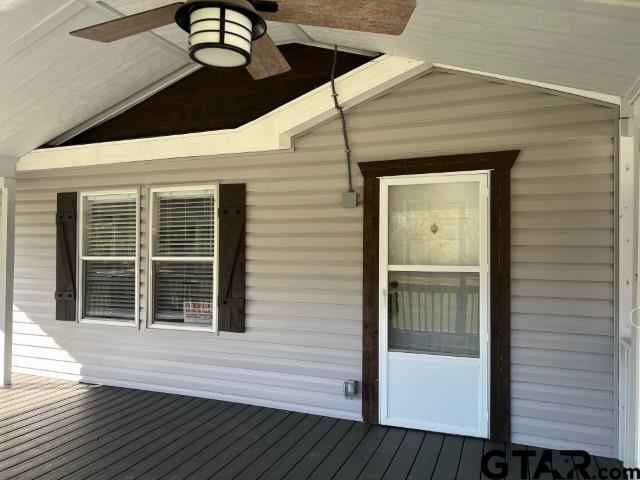 174 County Road 2604 Pittsburg, TX 75686 - Photo 2 of 22 a view of a porch with wooden floor