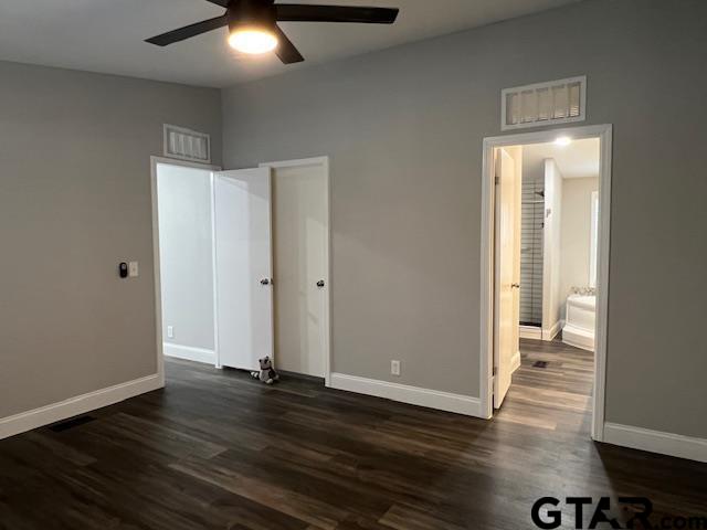 174 County Road 2604 Pittsburg, TX 75686 - Photo 5 of 22 an empty room with wooden floor and closet