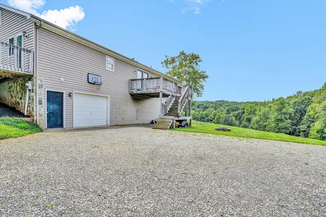 a house view with a backyard space