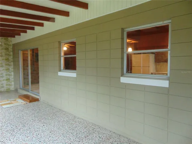 a view of a room with a window