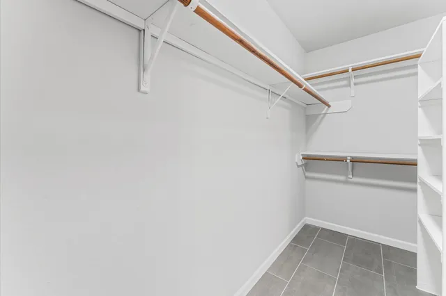 a view of an empty walk in closet