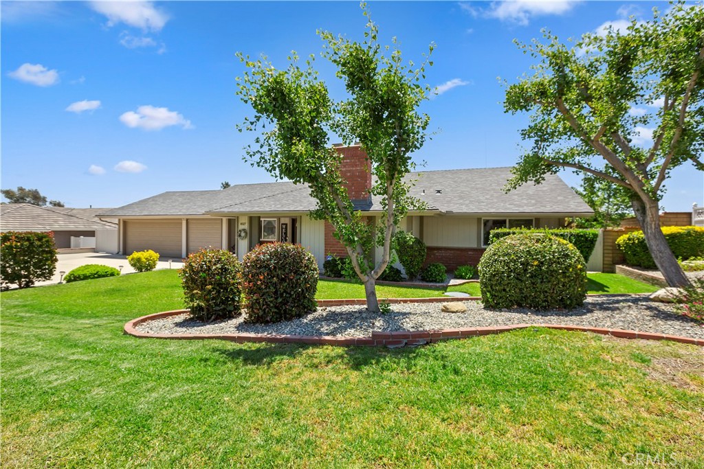 8527 Hillside Road Rancho Cucamonga, CA 91701 - Photo 2 of 50 a house with garden in front of it