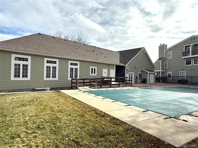 a view of a house with swimming pool