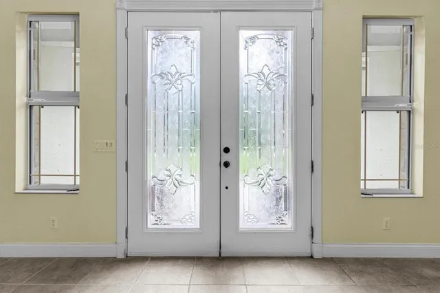 a view of a livingroom with furniture and window