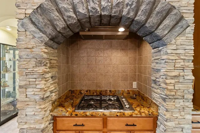a view of a livingroom with furniture and a fireplace