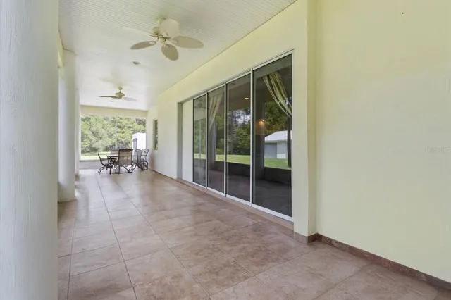 a workspace with furniture and a window