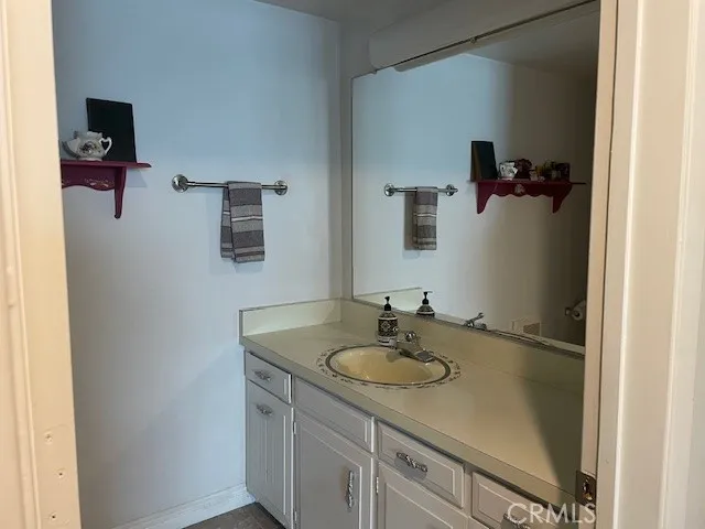 a bathroom with a glass door