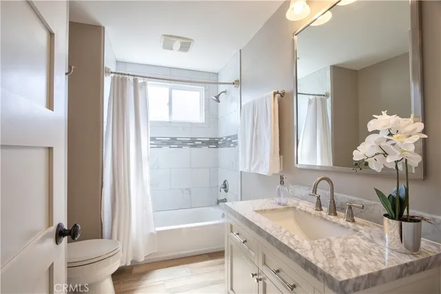 a bedroom with a bed and a closet