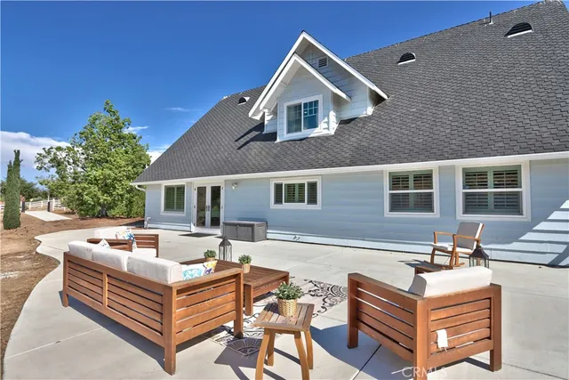 a view of a terrace with sitting area