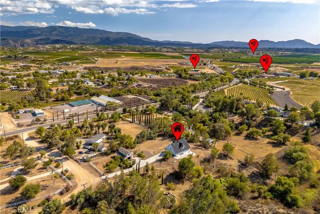 a view of houses covered with snow