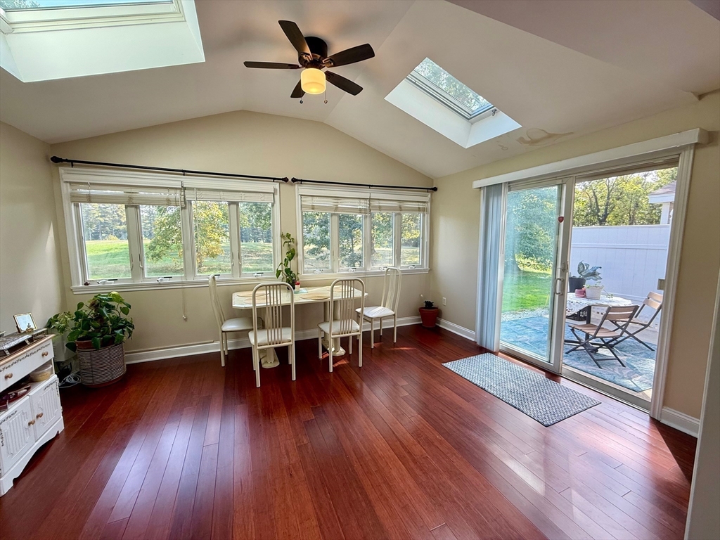 218 Rangeway Road, Unit 213 Billerica, MA 01862 - Photo 13 of 29 a view of a dining room with furniture window and wooden floor