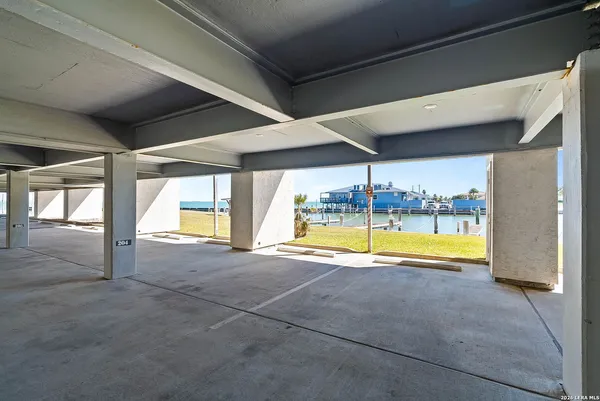 an aerial view of a houses with outdoor space