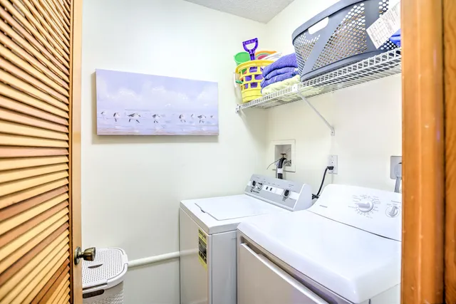 a bathroom with a sink mirror and vanity