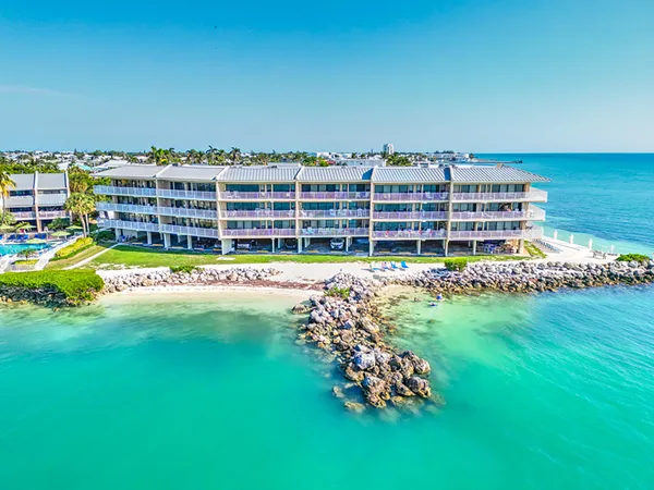 a view of an outdoor space and tennis court