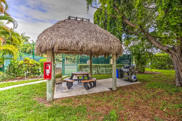 a view of a swimming pool with a lounge chairs