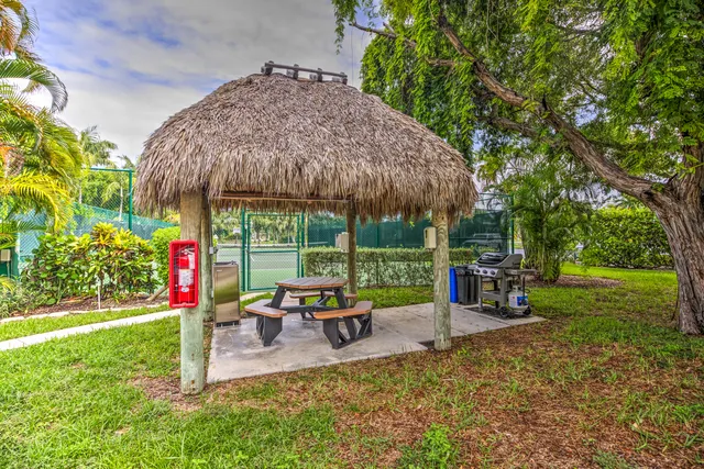a view of a swimming pool with a lounge chairs