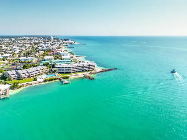 a view of a lake with a big yard