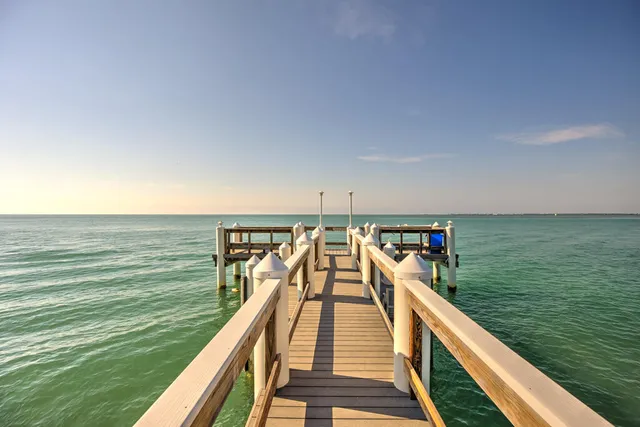 a view of a balcony with ocean view