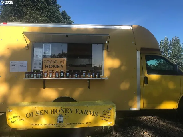 a view of swimming pool with a wooden bench